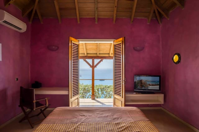 bedroom 01 ocean view - by J at Villa Hurakan