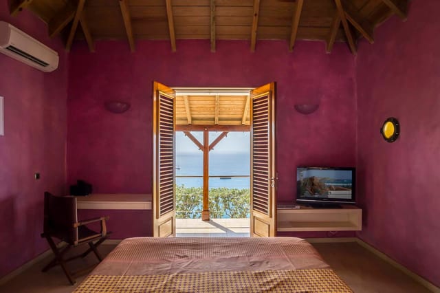 bedroom 01 ocean view - by J at Villa Hurakan