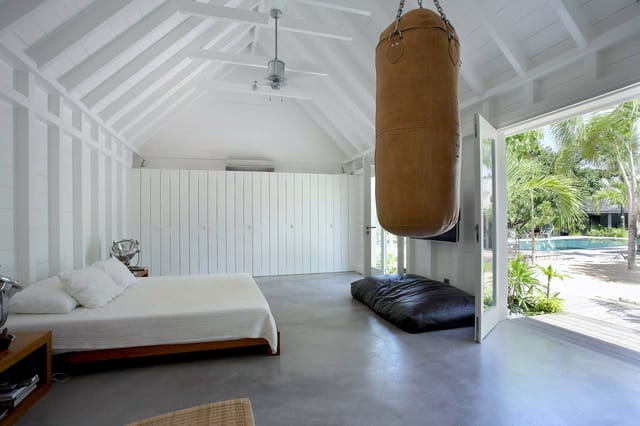 Manoir de Lorient bedroom 01 deck pool view at Villa Le Manoir de Lorient