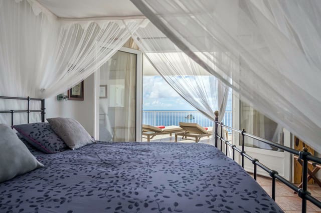 bedroom 2 ocean view - by J at Villa Manon