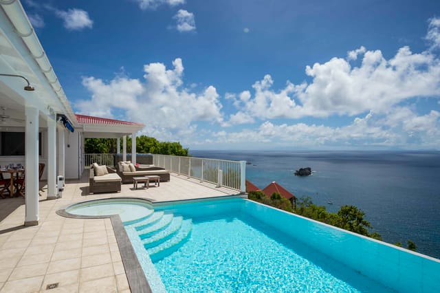 pool sunbeds - by J_1 at Villa Manon